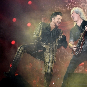 Adam Lambert and Brian May of Queen perform onstage
