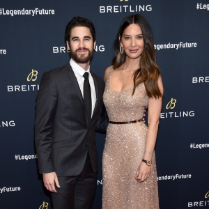 Darren Criss with Olivia Munn on the red carpet