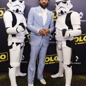 Actor Donald Glover and Stormtroopers