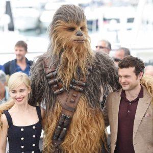 Emilia Clarke, Chewbacca and Alden Ehrenreich attend the Solo: A Star Wars Story